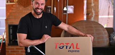 Total Express integra contratos de frete à plataforma Frenet para gestão de pedidos